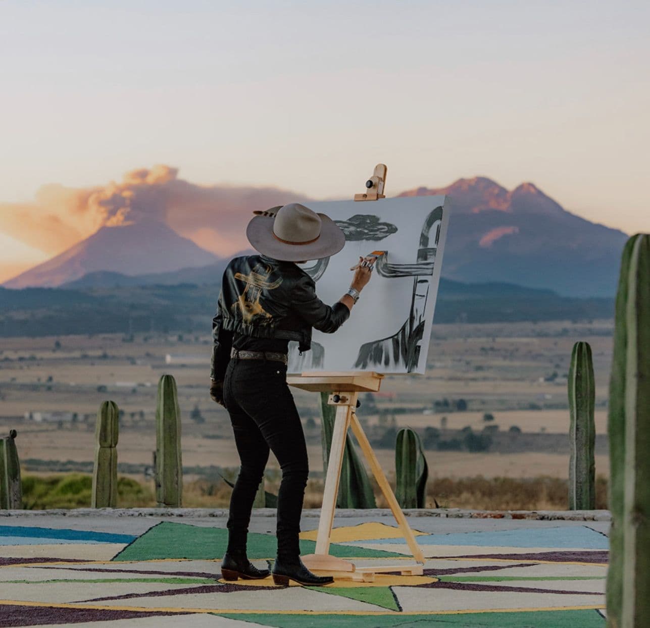 Laura Goodson paints outside