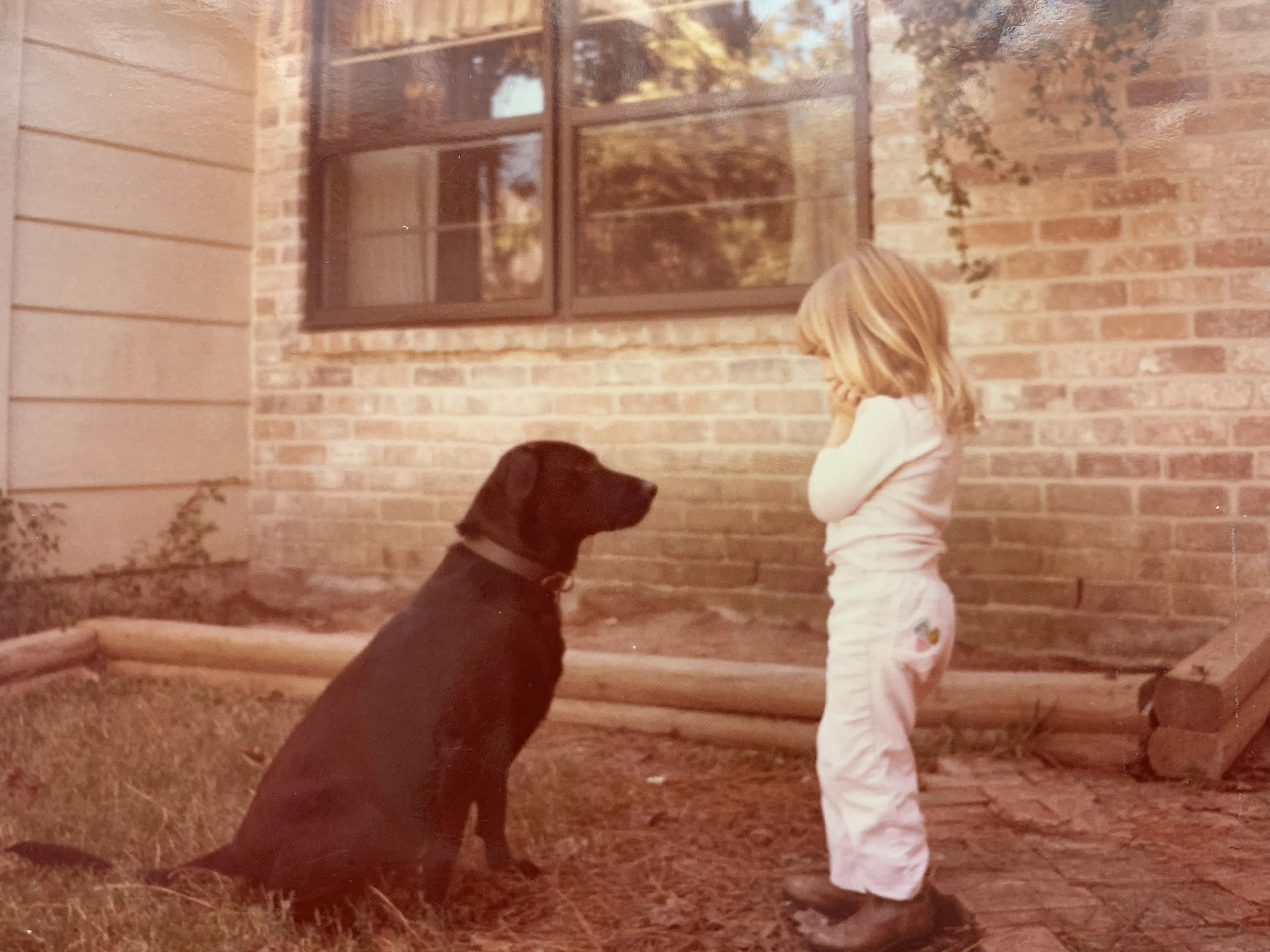 Sarah as a young girl in boots