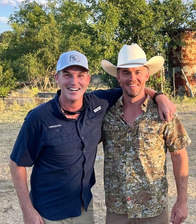 Jackson and Johnathan Lusk stand together